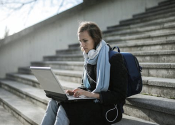 a woman using a laptop