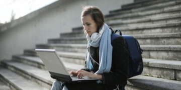 a woman using a laptop