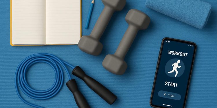 Athletic gear, water bottle, and sneakers arranged for a beginner workout preparation scene