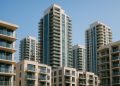Modern high-rise condominium exterior highlighting quality building features and amenities