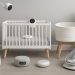 Smart nursery setup featuring tech-enabled baby monitor, crib, and connected baby gear